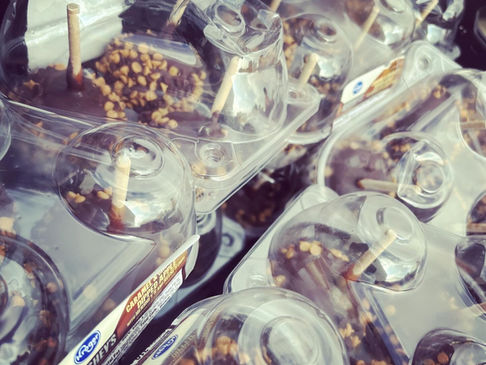 Families receive a Halloween treat at the Latest Banning Cure Hunger Now Food Outreach