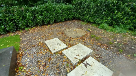 Before Porcelain stepping stone, granite fire pit, slate water feature & oak sleeper raised beds.