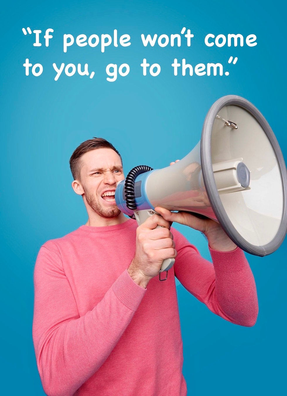 A man shouting into a megaphone
