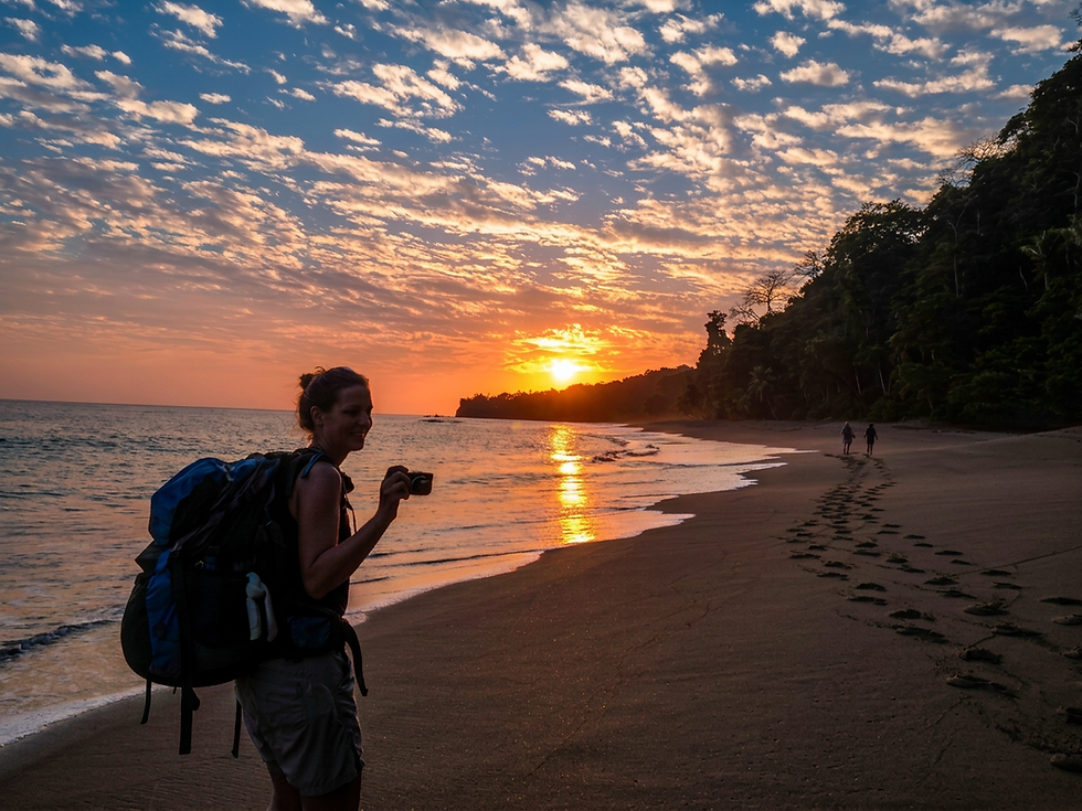 Hiker with sunset in the background