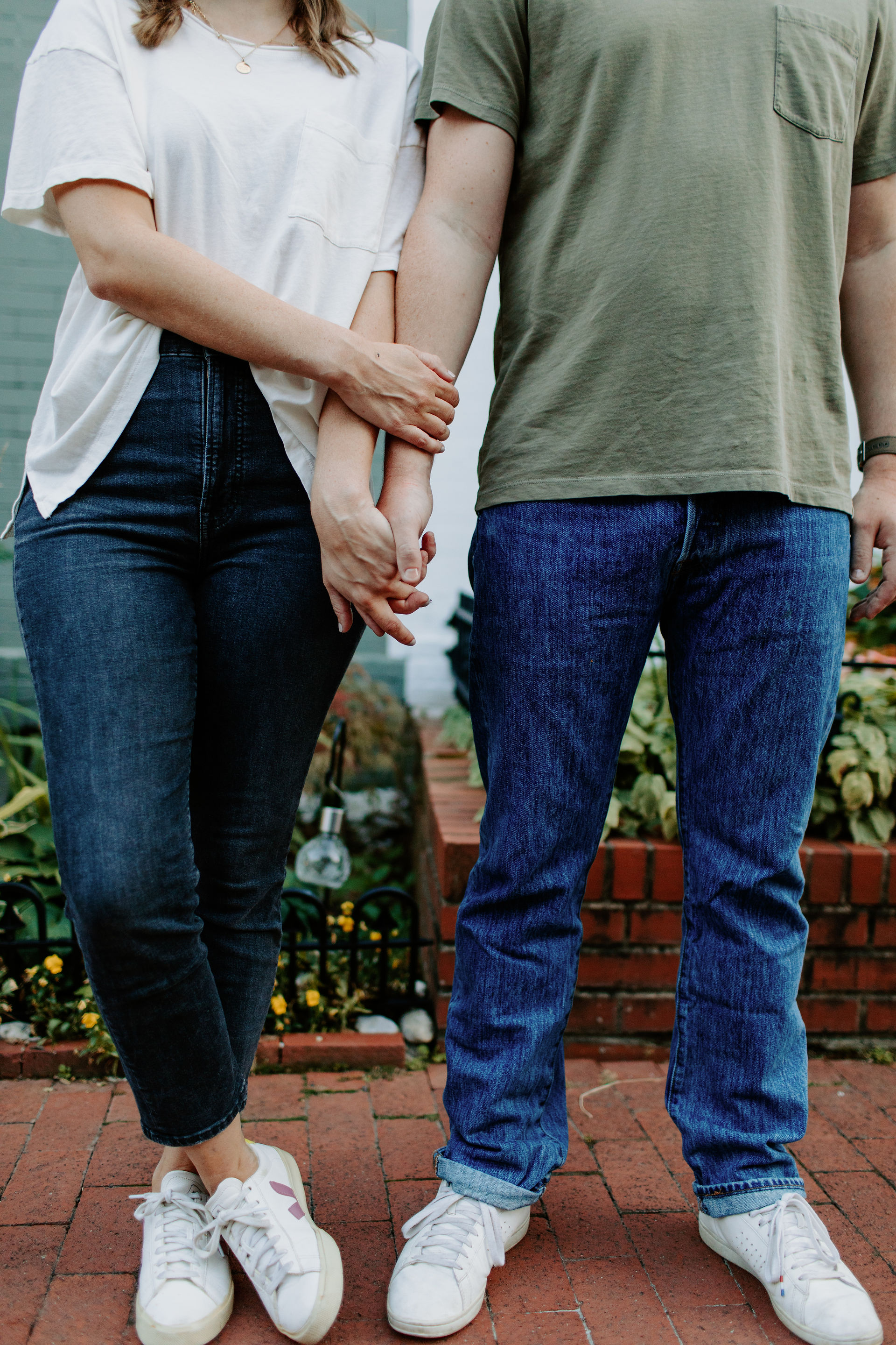 Claire & Sam hold hands