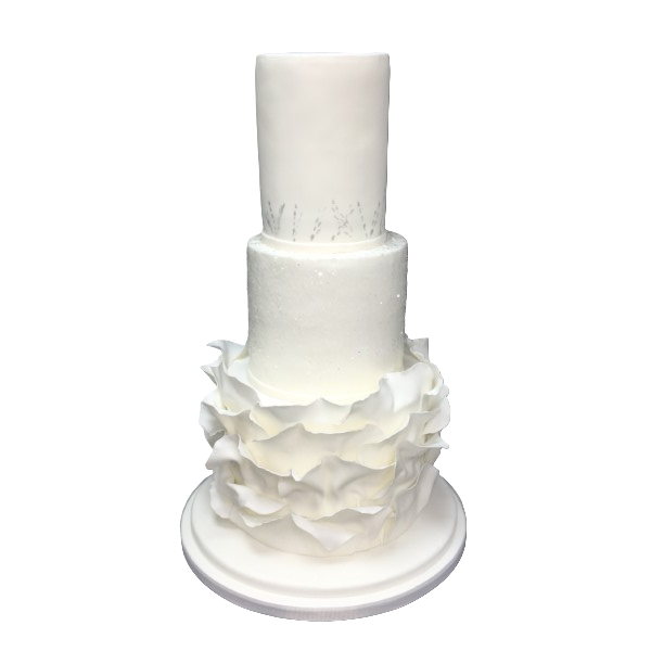 Three-tiered white wedding cake with sugar paste petals and floral motifs.