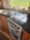 Caravan kitchen inside hire caravan from Cosy Caravan Hire Bay of Plenty