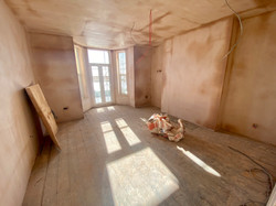 The Plastering begins