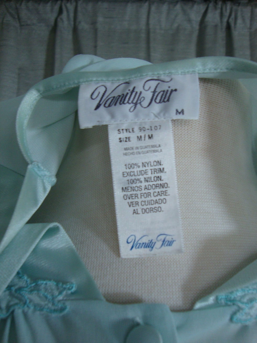 Thumbnail: Vanity Fair baby blue sleepwear tag, size M, 100% nylon.