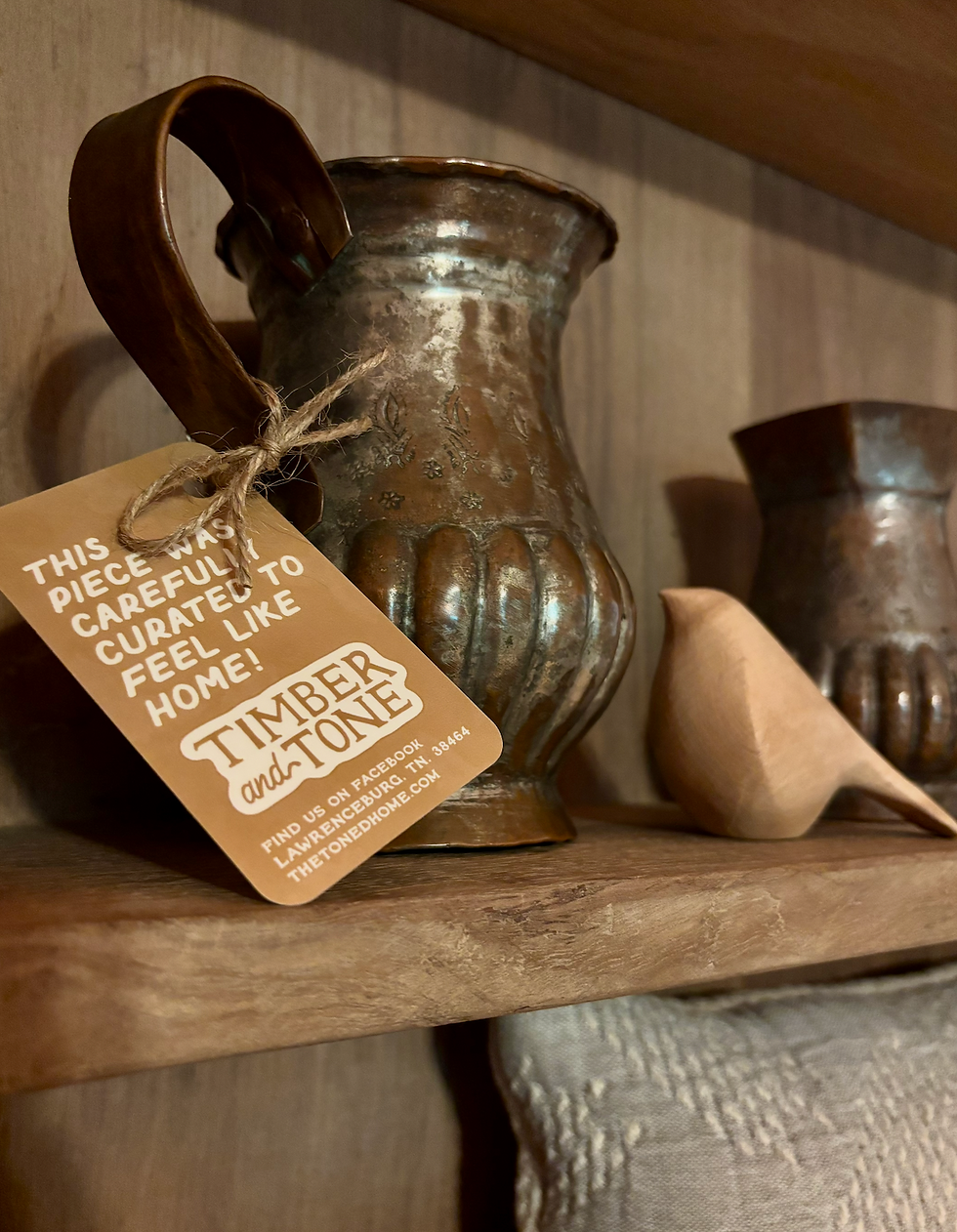 Timber and Tone’s hand-picked rustic metal pitcher with delicate floral embellishments—perfect for adding vintage charm to your home. Shop this curated, one-of-a-kind piece today.