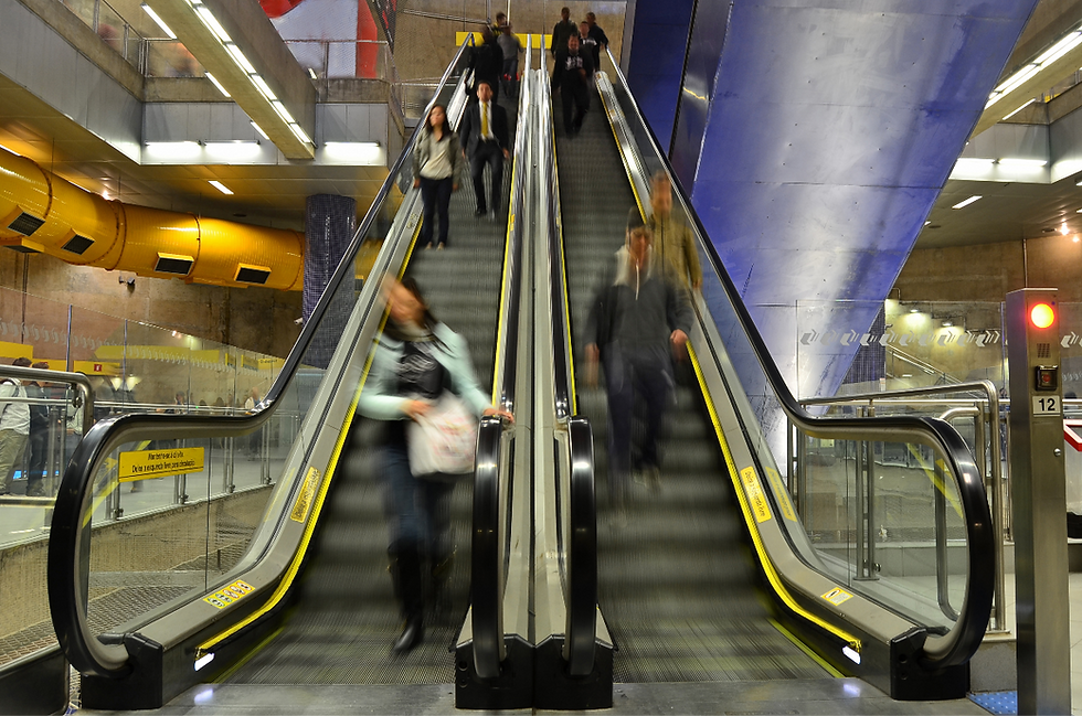 Taking the escalator in the subway