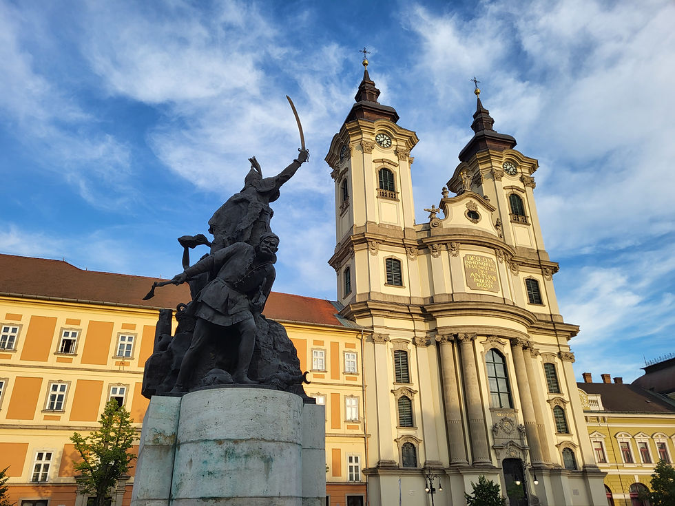 The Minorite Church and the statue of István Dobó in Eger