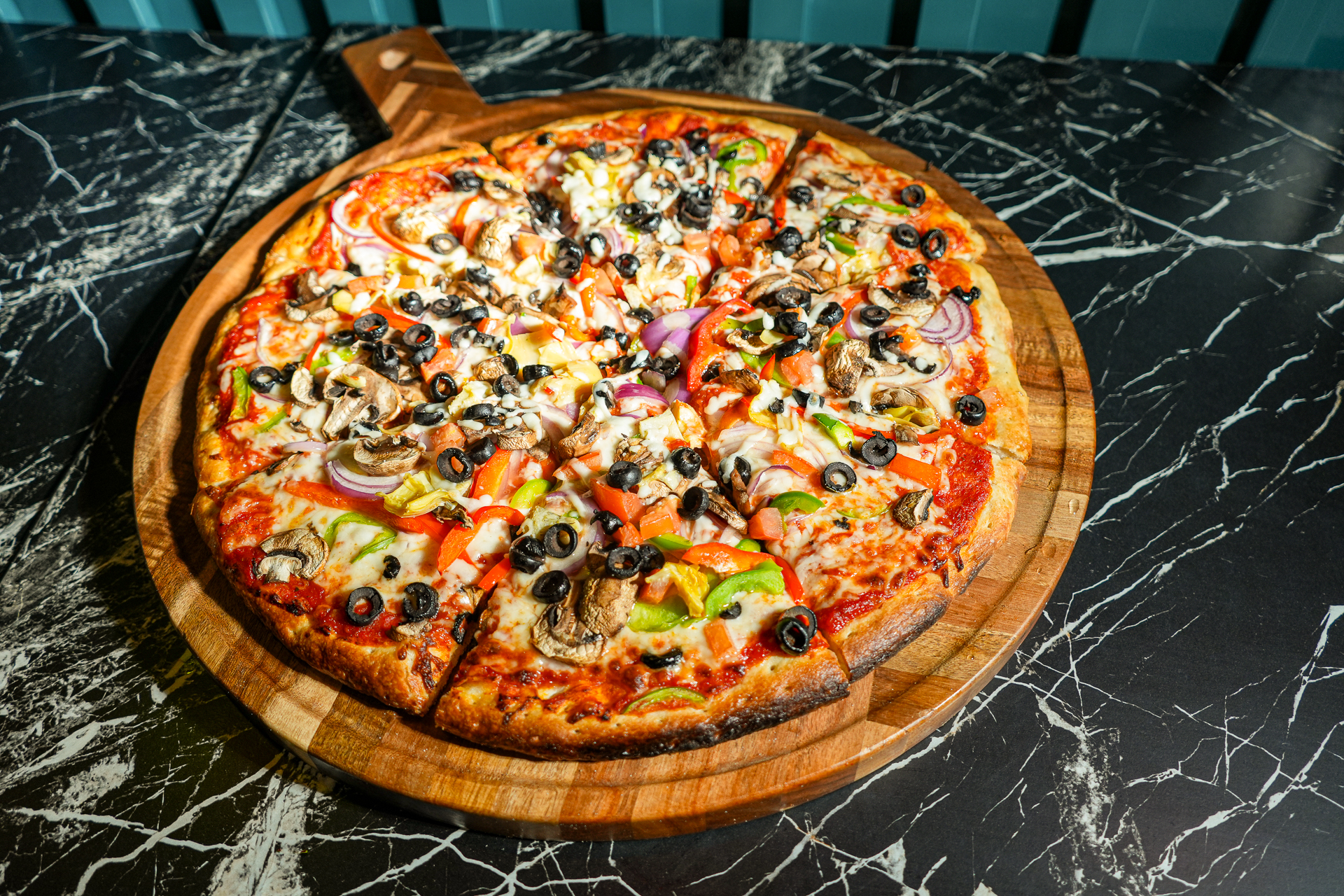 Premium Veggie Pizza from Spices and Slices