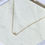 Thumbnail: Tiny pink and white pearl trio with gold filled chain necklace