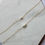 Thumbnail: Tiny pink and white pearl trio with gold filled chain necklace