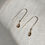 Thumbnail: Gold wire threaders with whiskey zircon dangle