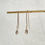 Thumbnail: Gold wire threaders with whiskey zircon dangle