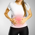 woman holding cramping belly