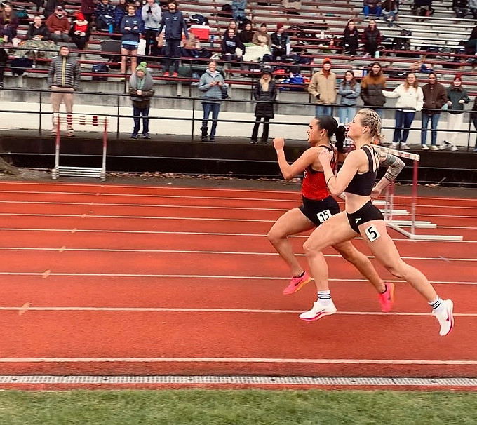 Mo Frazier competing in a race neck and neck with college athlete