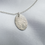 Thumbnail: DOUBLE SIDED SILVER, OVAL FINGERPRINT NECKLACE