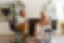 staff sitting in salon chairs