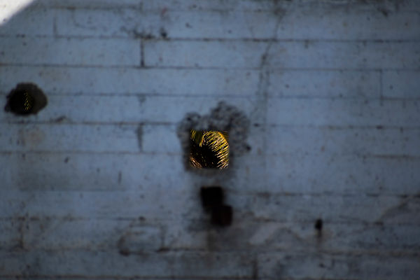 Palm Through Wall Hole.jpg