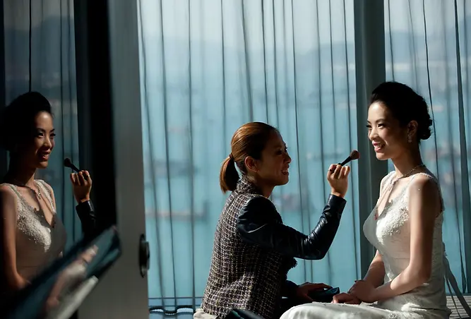 Ka Lam applying bridal makeup for a wedding at the W Hotel Hong Kong