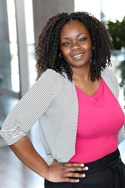 Headshot of young professional at indoor Tallahassee location by Professional Photographer, Inga Finch