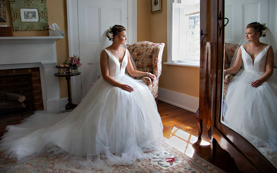 Bride watching guests arrive