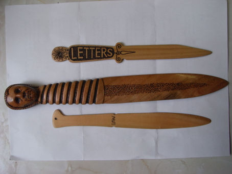 Cherrywood letter openers. I.Woods.