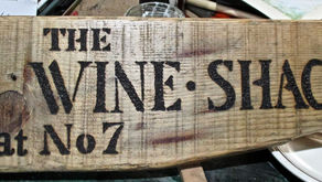 Another wine-bar sign. Pyrography on reclaimed board.