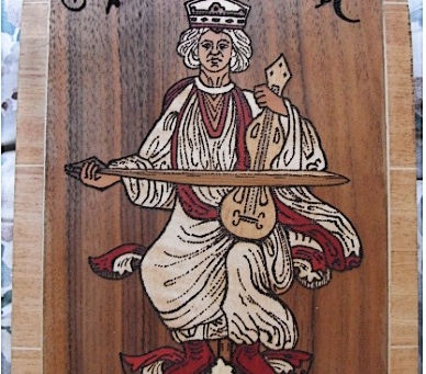 Musick plaque. Pyrographed.