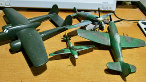 WW2 planes, wooden and painted. My Dad made these in the fire service.