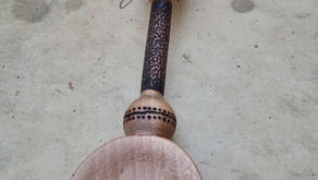 Ashes spoon. Cricket bat and ball. Cherry.