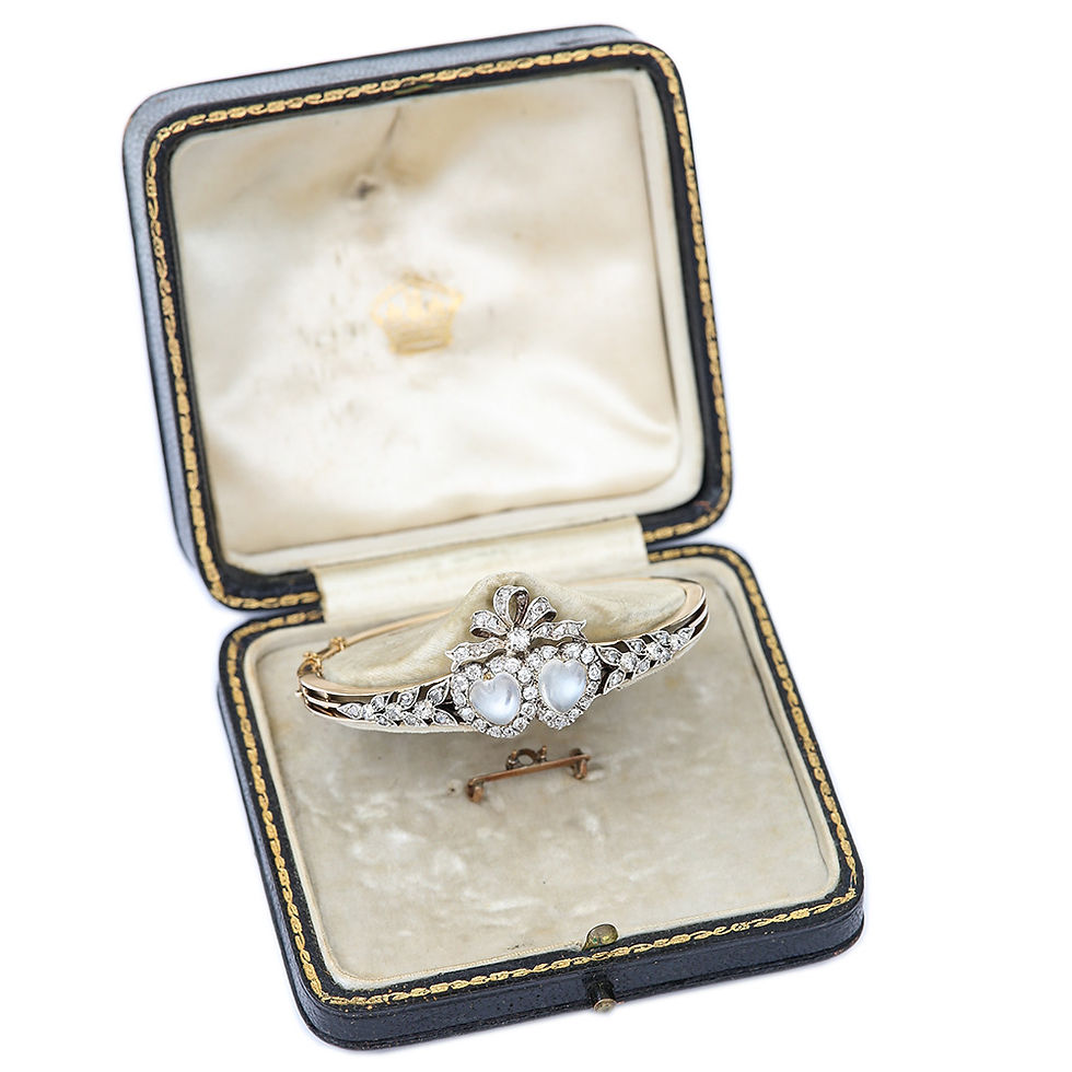 Thumbnail: Victorian Moonstone Hearts and Bow Diamond Bangle 18 Karat Gold and Silver