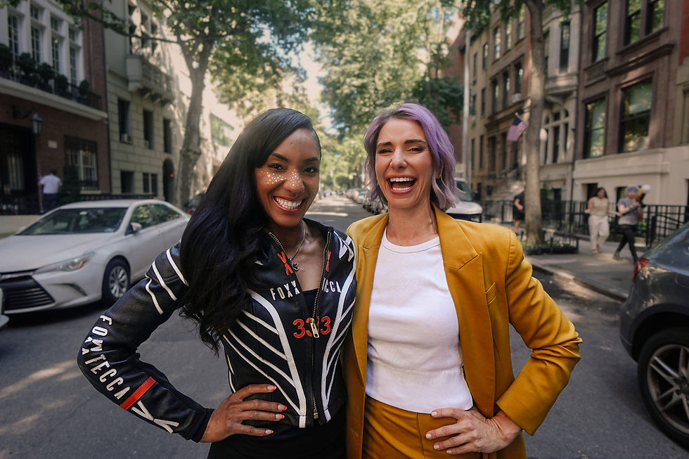 Dystany Spurlock Standing with Emily Tisch Sussman