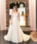 Bride standing in her wedding dress