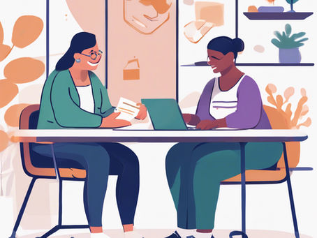 An NDIS planner engages in a productive meeting with a client, discussing personalized goals and support strategies in a positive and supportive environment.