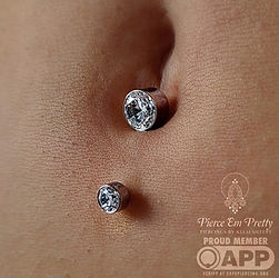 Fresh Lower Navel with a Classic Bezel Set White CZ Titanium Navel Curve (Side)