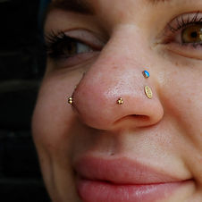 Mantis Piercings (Left Side View) with Yellow Gold 3 Dot Ends from Alchemy