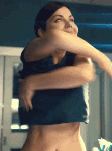cloth erica-durance-take-off.gif