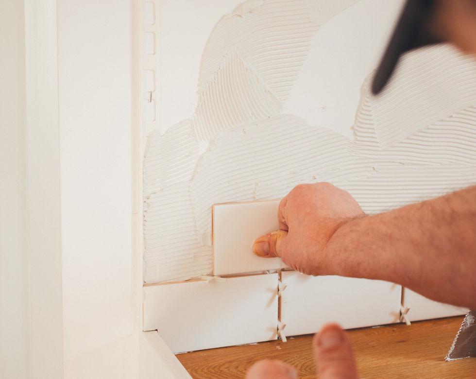 A skilled Handwerker in Cologne, booked through Co-Tasker, repairing kitchen cabinets. Find local professionals for home repairs, plumbing, and electrical work today!