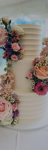 mixed combed and smooth ganache with fresh florals.jpg