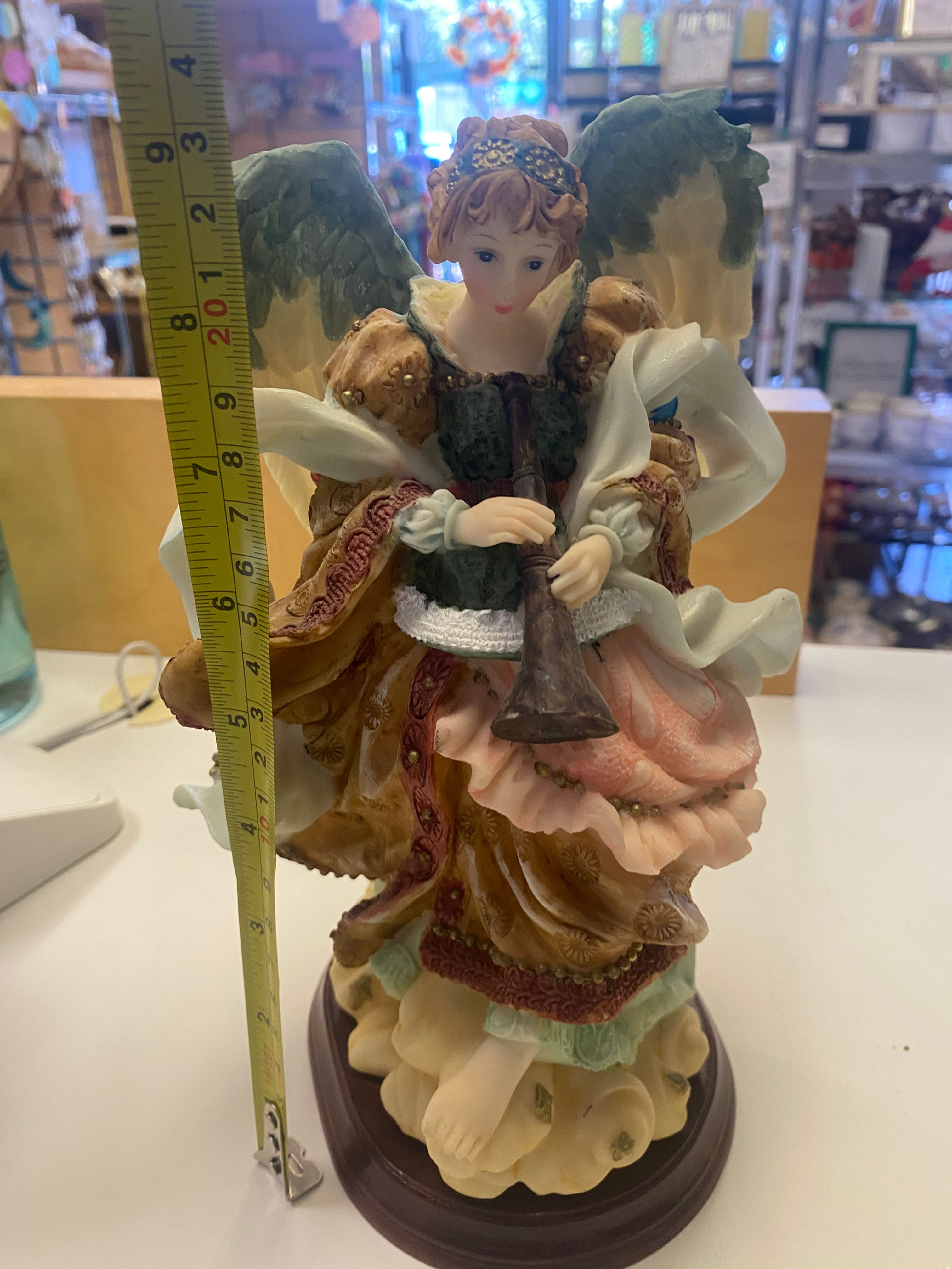 Angel blowing horn