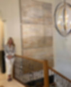 This multi-panel installation adds visual interest and architectural scale while maintaining a soft,