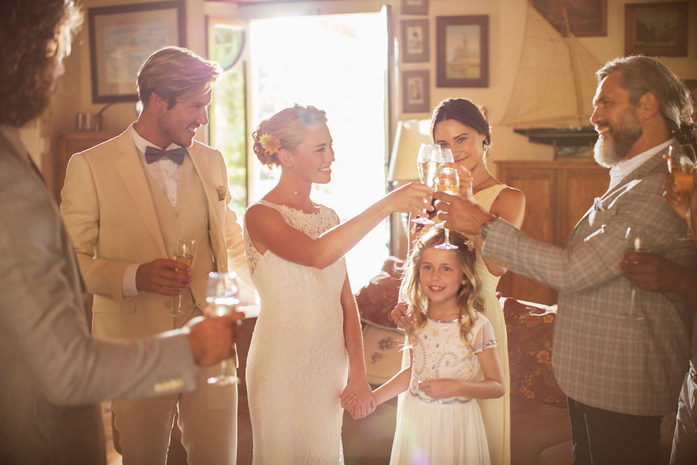 a cheers moment at a wedding