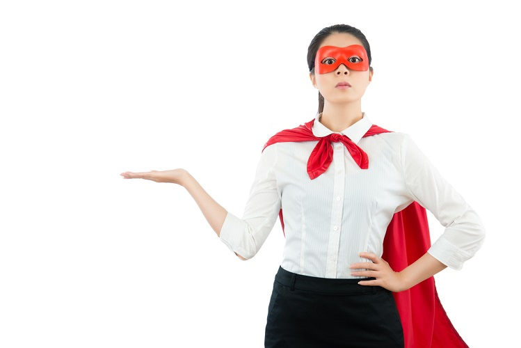 Young adult Asian woman in business attire, a white shirt and black narrow skirt, with a red cape and red eye mask posing poses confidently with her right hand outstretched to her right side, palm up, as if asking you a yes or no question, with an expression that shows she is challenging you to answer. Background is plain white.
