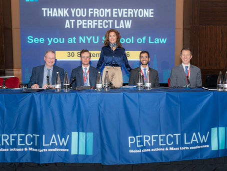 “Perfect Law” conference panel with five speakers in front of a screen announcing an event at NYU School of Law.