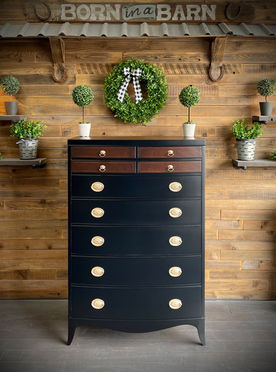Black 9-Drawer Hepplewhite Dresser with dark wood accents