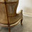 Thumbnail: Antique French Louis XV Style Double Caned Balloon Porter Chair circa 1930s.