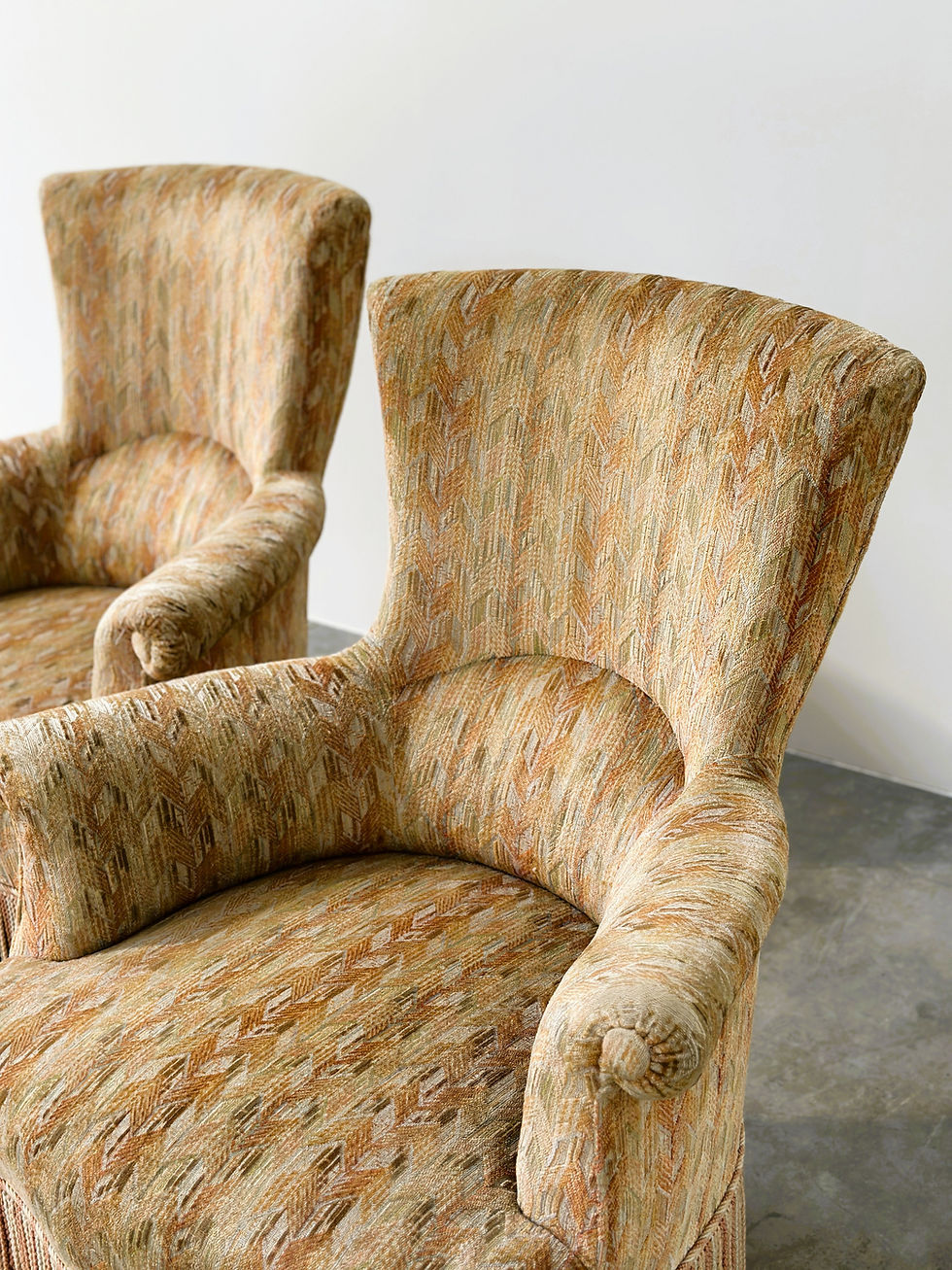 Thumbnail: Pair of Sculptural Hollywood Regency Lounge Chairs with Original Fringed Upholst