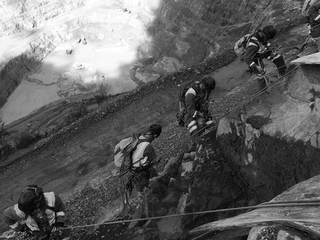 Rope access crew use airbags for scaling on a highwall