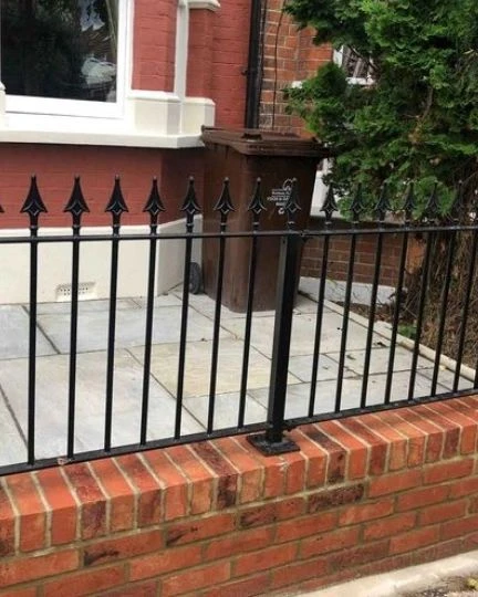 railings fabricated and installed for front of garden porch 