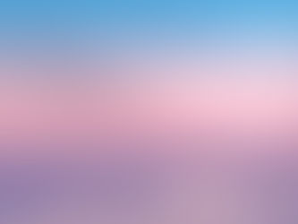A soft pastel sky with fluffy clouds.